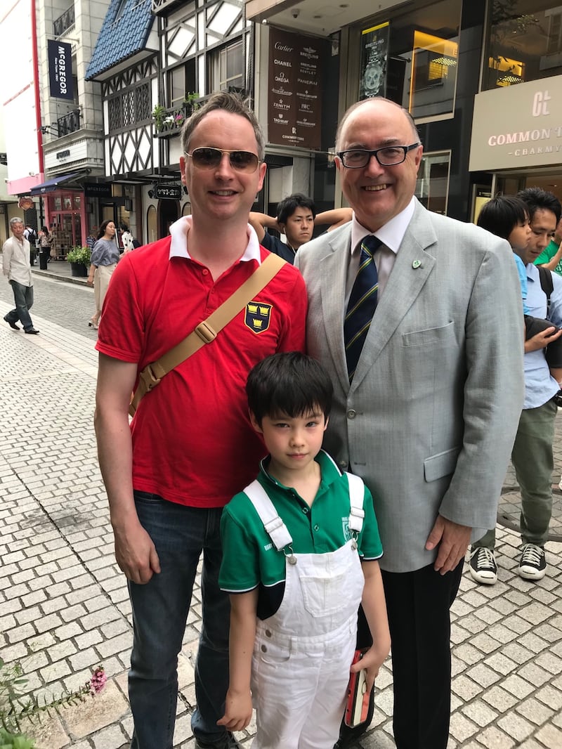 Limerick man Andrew McCarthy (far left) with his son Ronan McCarthy (front) and Ireland’s Ambassador of Ireland to Japan Paul Kavanagh at the Rugby World Cup Ireland festival in Yokohama.