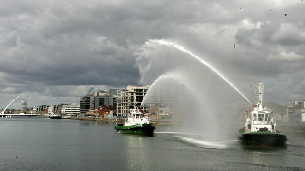 A water display on the Liffey by the Dublin Port tugs after the signing of a contract by Gaelectric Holdings to co-develop three Irish wind farms in 2011. Stockholm-based Proventus recently loaned €65 million to green energy developer Gaelectric. Photograph: Dara Mac Dónaill