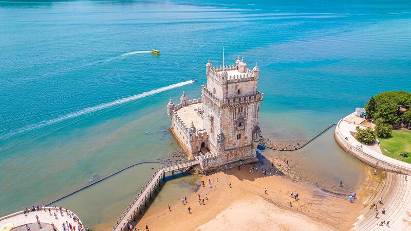 See the iconic Belem Tower in Lisbon