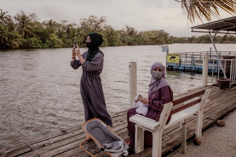 Majid Khan’s wife Rabia Khan, right, and their daughter, Manaal, who both relocated from Pakistan last year, in Belize City. Photograph: Natalie Keyssar/New York Times