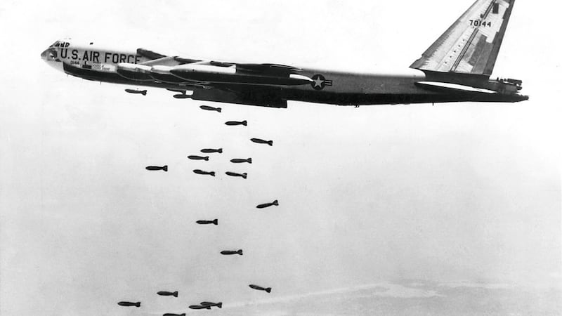A US air force B-52 drops a string of 750lb bombs on Vietnam in October 1965, during the Vietnam War. Photograph: US air force/New York Times