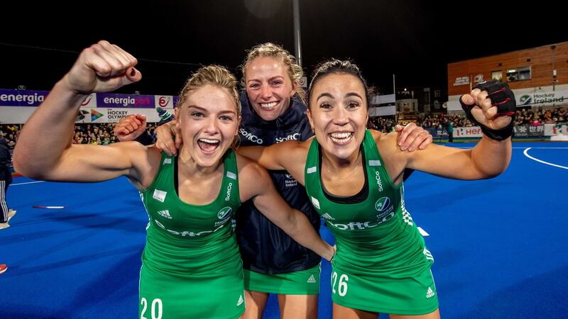 Chloe Watkins, Hannah Matthews and Anna O’Flanagan celebrate Ireland’s qualification for the Tokyo Olympics. Photograph: Morgan Treacy/Inpho