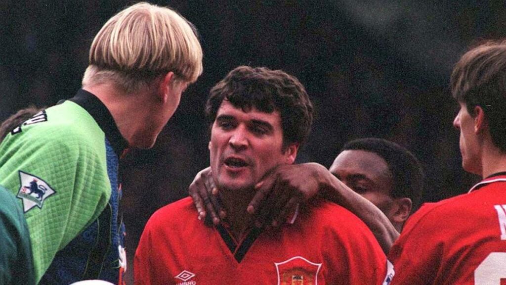 Peter Schmeichel says that he is surprised former Manchester United teammate Roy Keane is employed by the FAI. Pictured is Keane being restrained by Paul Parker and Gary Neville as he argues with Schmeichel in 1995. Photo: John Giles/PA Wire.