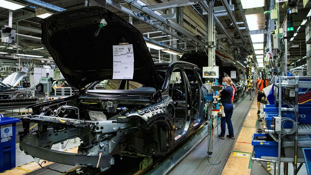 Employees working on the production line of Swedish automaker Volvo Cars’s Torslanda production plant in Gothenburg. Photograph:  Jonathan Nackstrand/AFP