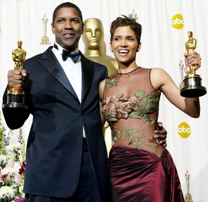 Denzel Washington and Halle Berry with their Oscars in 2002. Photograph: Frederick M. Brown/Getty Images