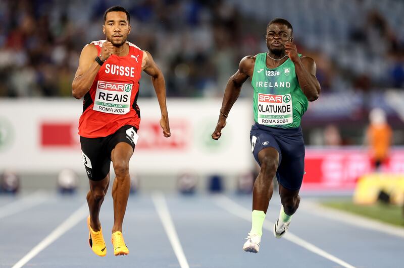 Israel Olatunde, right, in action in the semi-final of the men's 100m semi-final. Photograph: Morgan Treacy