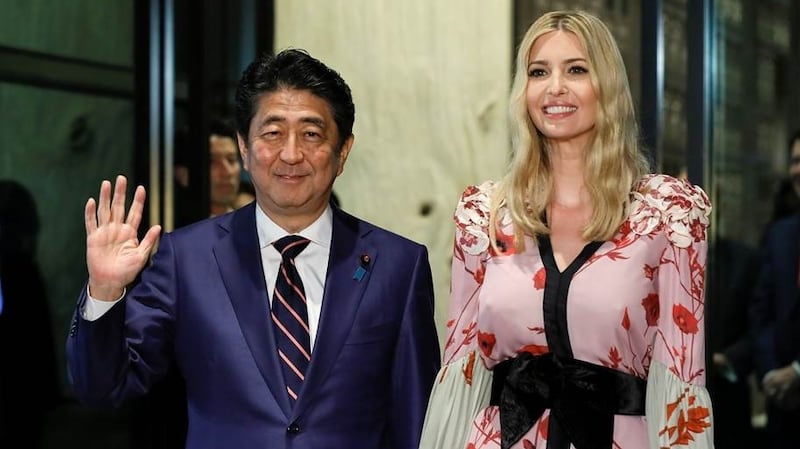 Ivanka Trump is welcomed by Japanese Prime Minister Shinzo Abe for a dinner at a restaurant in Tokyo on Friday. Photograph: Kimimasa Mayama/AFP/Getty Images