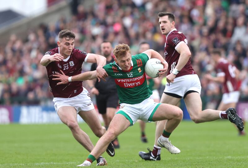 Galway's Matthew Tierney and Jack Carney of Mayo. Photograph: Bryan Keane/Inpho