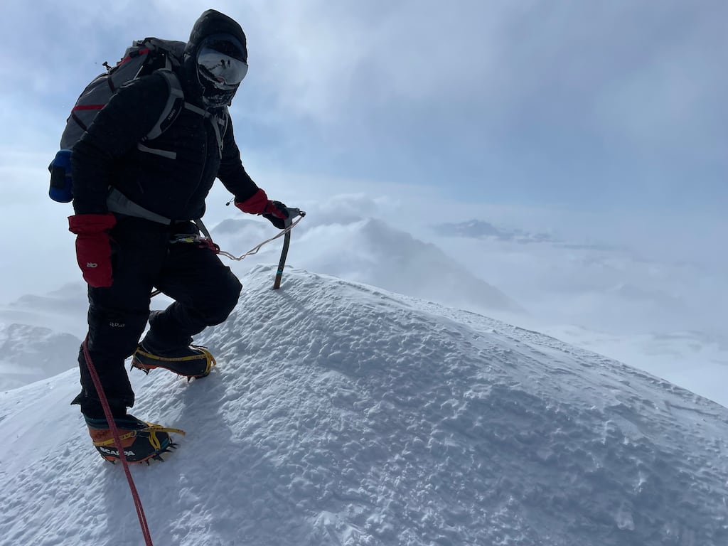 Irish climber Rory McHugh at the summit of Mount Vinson, which at 4,892m is the highest mountain in Antarctica.