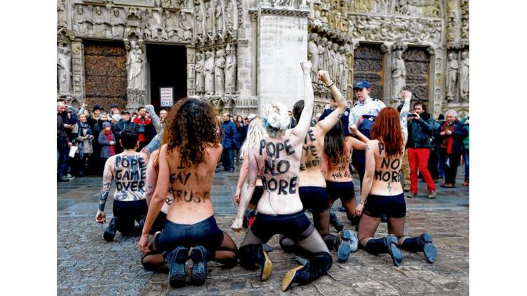 Activists from the women's rights group Femen at Notre Dame yesterday. photograph: charles platiau/ reuters