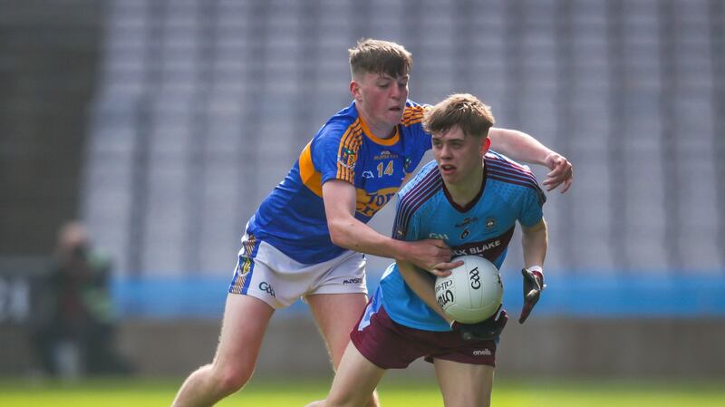 Josh Largo Ellis of St Michael’s College, Enniskillen is challenged by Naas CBS’s Dermot Hanafin during the Hogan Cup Final at Croke Park. Photograph: Oisín Keniry/Inpho