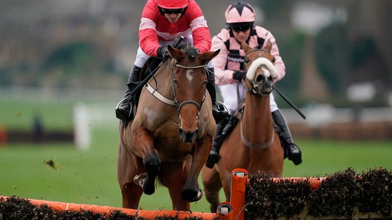 Ruby Walsh and Laurina lead Sensulano and Barry Geraghty at Sandown. Photograph: Alan Crowhurst/Getty