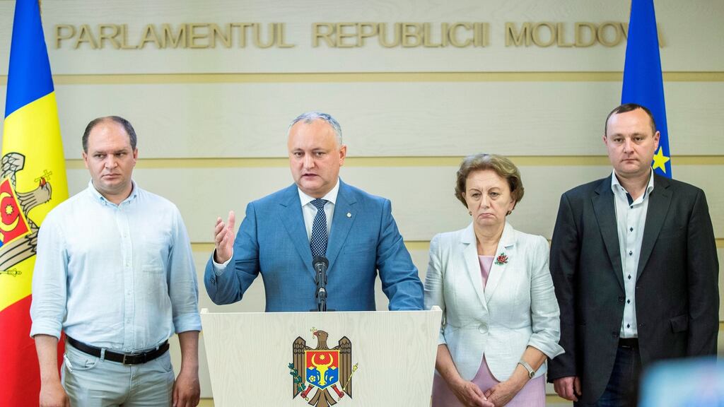 President of Moldova Igor Dodon, second from left, during a briefing in the parliament building in Chisinau, Moldova. Photograph: Dumitru Doru/EPA