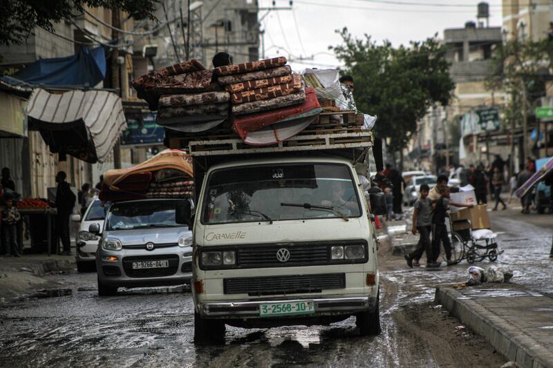 Palestinians flee following Israeli army orders to evacuate the eastern side of Rafah, Gaza, on Monday, ahead of military operations in the city. Photograph: Ahmad Salem/Bloomberg