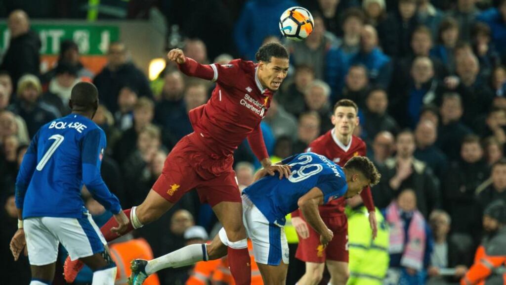 Liverpool’s Virgil van Dijk during his debut at Anfield. Photograph: PA