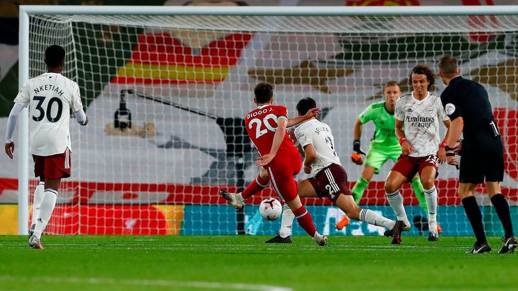 Diogo Jota scores on his Liverpool debut against Arsenal. Photograph: Jason Cairnduff/Getty/AFP