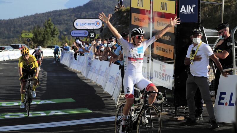 Slovenian rider Tadej Pogacar celebrates his Stage 15 victory in the Tour de France, ahead of Primoz Roglic in the yellow jersey. Photograph: Christophe Petit-Tesson/EPA