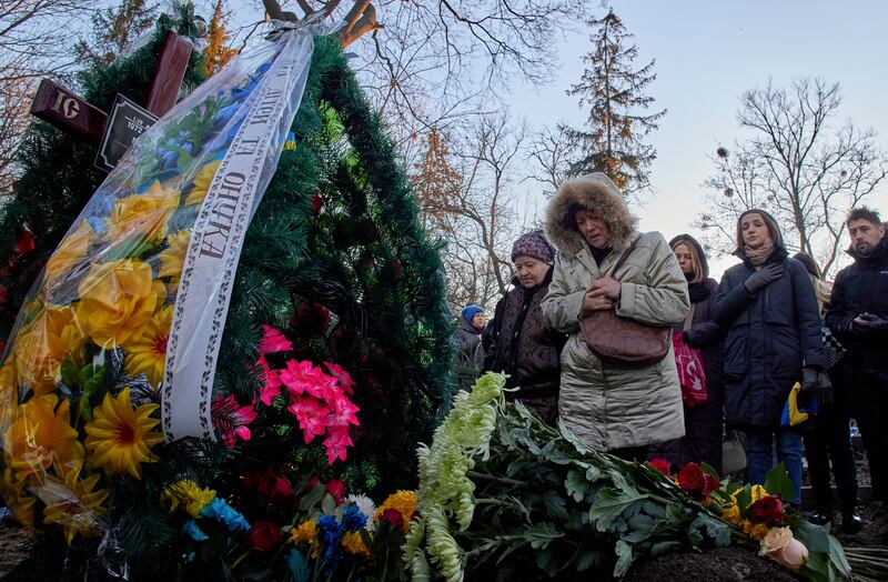 Friends and relatives attend the funeral of Ukrainian writer and poet Volodymyr Vakulenko in Kharkiv, Ukraine. Photograph: Sergey Kozlov/EPA-EFE