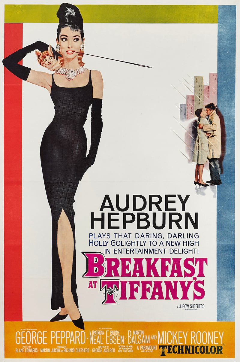 In an image provided by Paramount, Robert E. McGinnis’s poster for ‘Breakfast At Tiffany’s.’ McGinnis, whose lusty, photorealistic artwork of curvaceous women adorned more than 1,200 pulp paperbacks, as well as classic movie posters, died at home in Old Greenwich, Conn. on March 10, 2025. He was 99. (Paramount via The New York Times) — NO SALES; FOR EDITORIAL USE ONLY WITH OBIT MCGINNIS by GABRIEL of APRIL 17, 2025. ALL OTHER USE PROHIBITED —