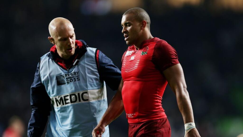 England’s Jonathan Joseph receives treatment during the opening Rugby World Cup match at Twickenham against Fiji. Photograph: David Davies/PA