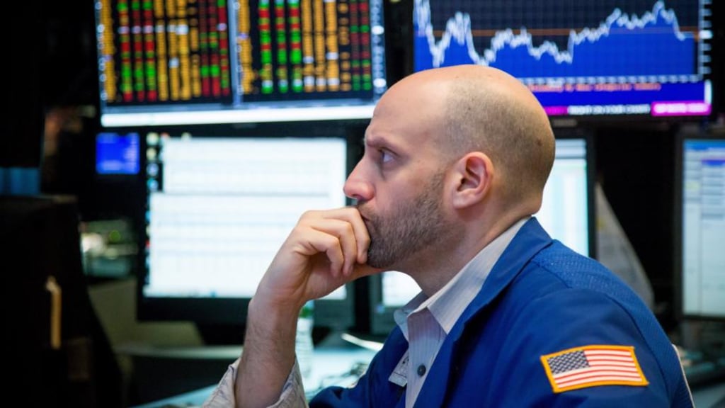 A trader on the floor of the New York Stock Exchange: bull and bear market cycles can be difficult to reliably identify. Photograph: Michael Nagle/Bloomberg