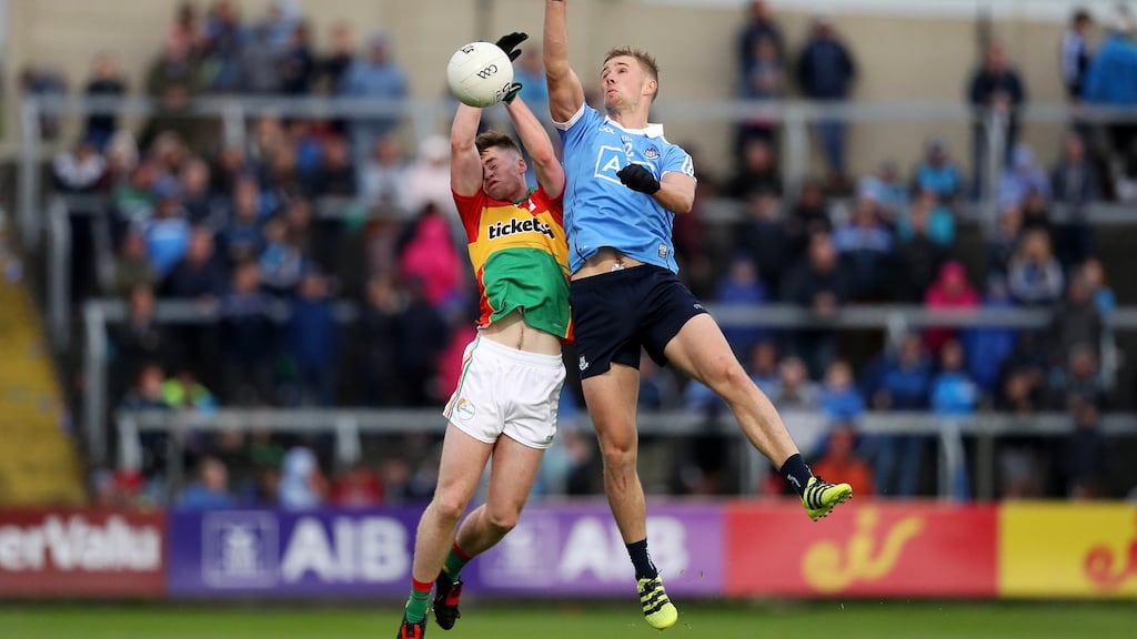 Carlow’s Mark Rennick and Dublin’s Paul Mannion during their Leinster quarter-final at O’Moore Park, Portlaoise, in June. Photograph: Tommy Dickson/Inpho