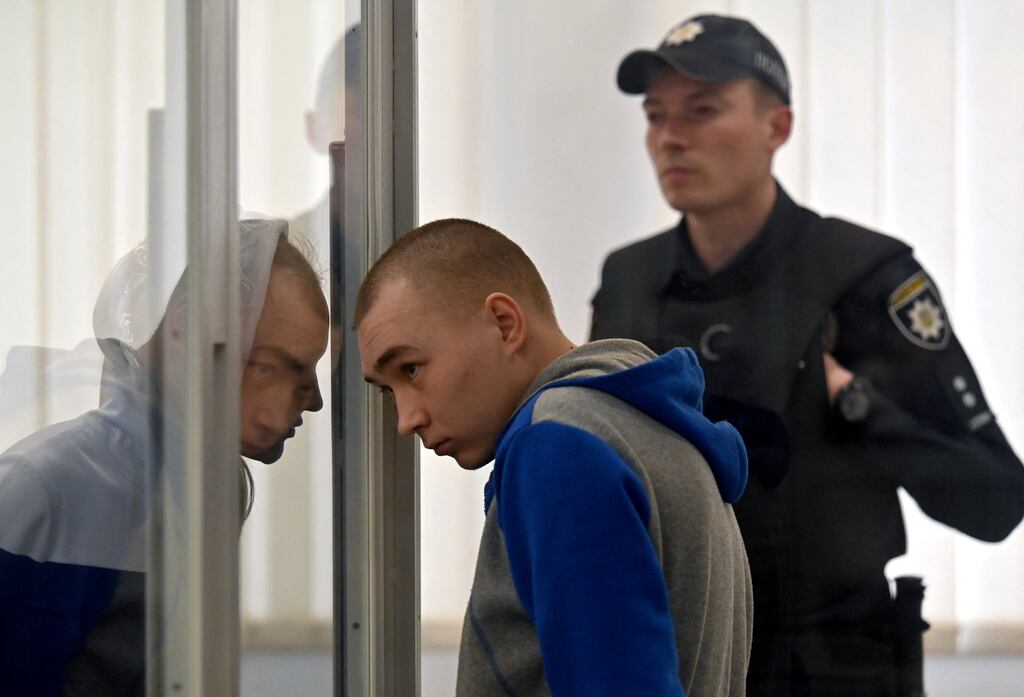 Russian soldier Vadim Shishimarin in the defendant's box on the last day of his trial on charges of war crimes for having killed a civilian, at a courthouse in Kyiv on May 23rd. Photograph: Sergei Supinsky/AFP via Getty Images
