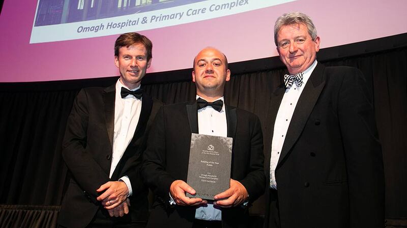 Brendan O'Riordan, CEO, Zutec presents the Building of the Year – Public award to John Keogan & John Palmer, TODD Architects.