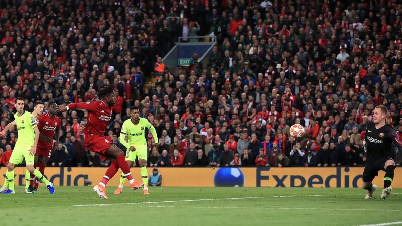 Origi scores the fourth. Photo: Peter Byrne/PA Wire