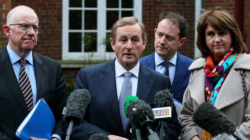 Taoiseach Enda Kenny with (from left) Minister for Foreign Affairs Charlie Flanagan, Seán Sherlock Minister of State at Department of Foreign Affairs and Tánaiste Joan Burton  at Stormont House, Belfast, ahead of the talks. Photograph: Brian Lawless/PA Wire