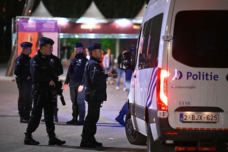 Police officers patrol as supporters leave the King Baudouin Stadium following the Euro 2024 qualifying football match between Belgium and Sweden in Brussels. Photograph: John Thys/AFP via Getty Images
