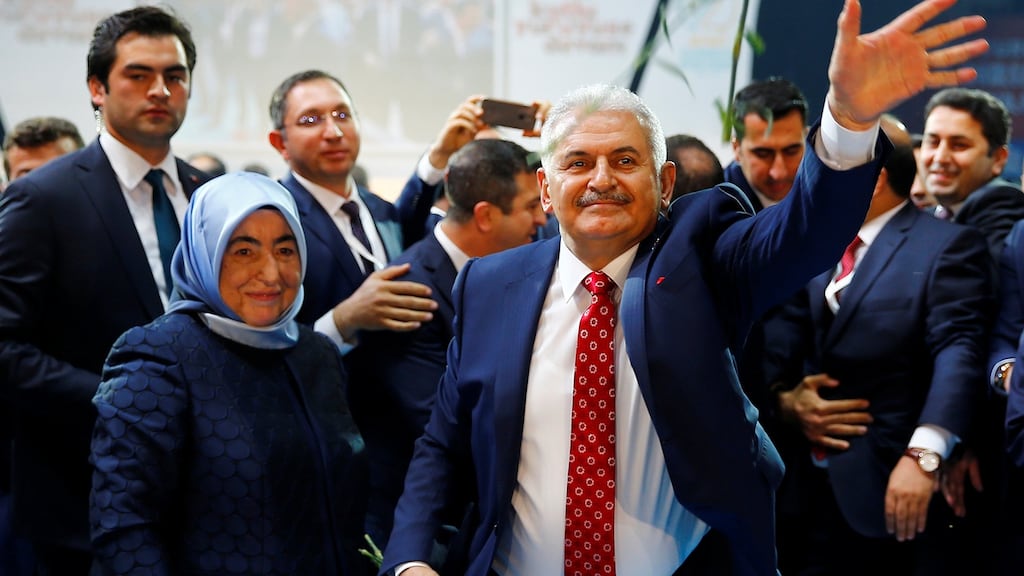 Binali Yildirim, and his wife Semiha, arriving for the extraordinary congress of the ruling AK Party (AKP) where he was voted leader. Photograph: Umit Bektas/Reuters