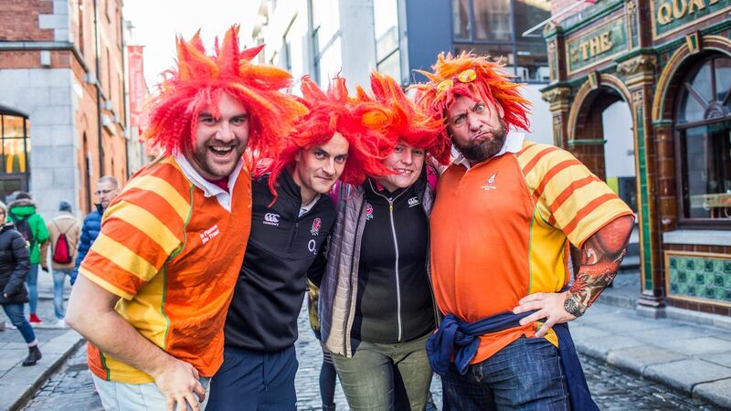 British fans Russel Clarke, Peter Holian, Laura Holian and Phil Erenenko in Temple Bar, Dublin ahead of the rugby match. Photograph: James Forde