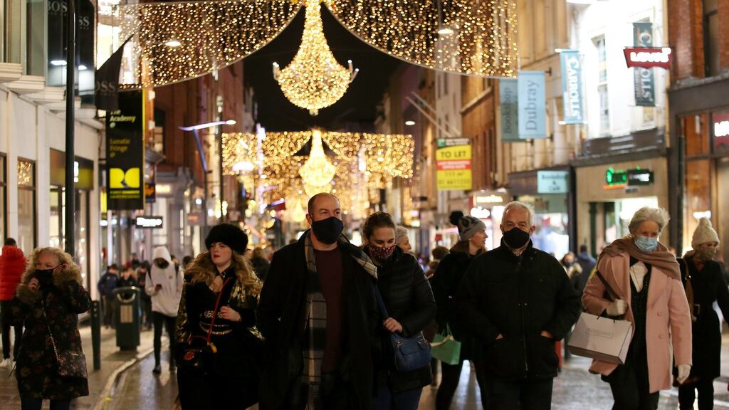 Shoppers on Grafton Street in Dublin on Friday, on the first evening of the reopening of gastropubs and restaurants. Photograph: Laura Hutton