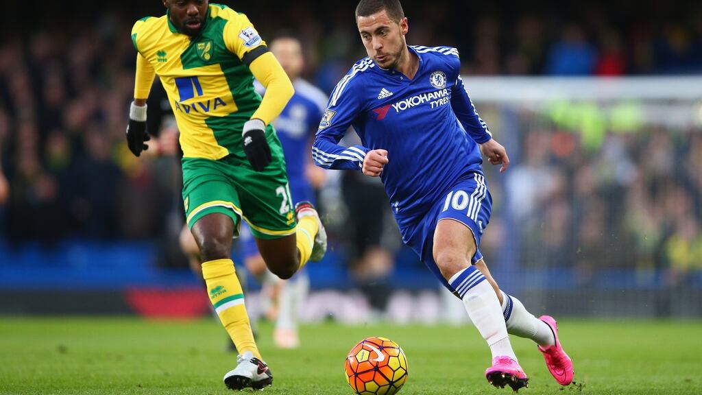 Eden Hazard of Chelsea and Youssouf Mulumbu of Norwich City in action  during the  Premier League match at Stamford Bridge. Photo: Paul Gilham/Getty