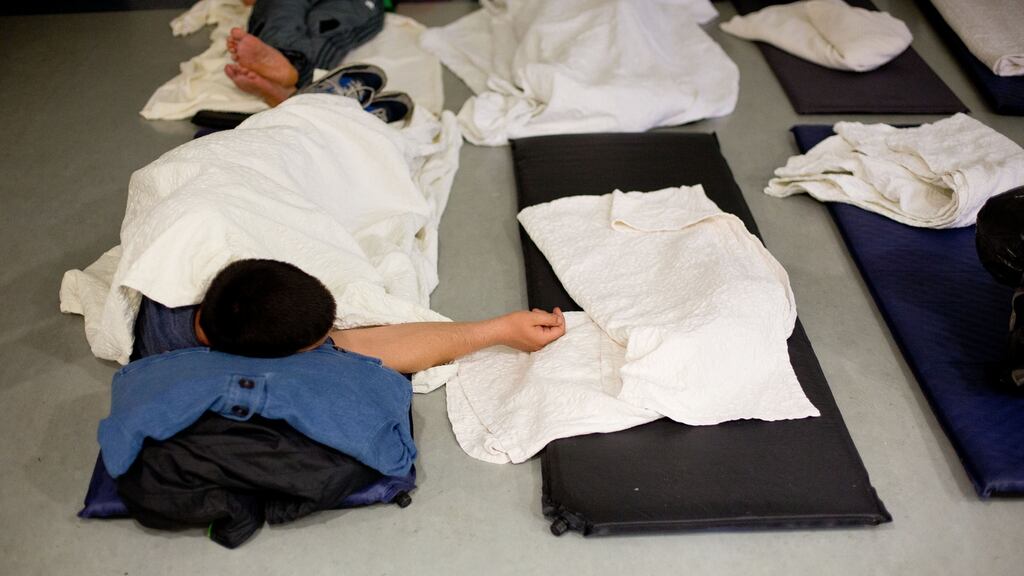 Homeless people bed down for the night at Merchants Quay Night Cafe. Photograph: Tom Honan.
