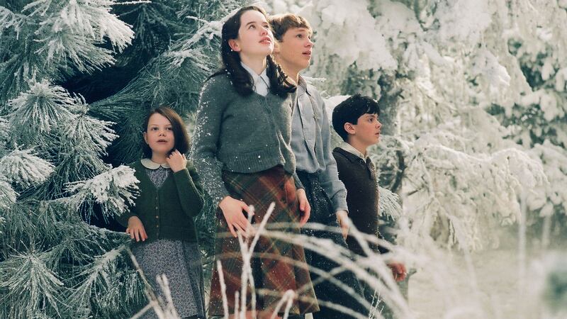 Lucy (Georgie Henley), Susan (Anna Popplewell), Peter (William Moseley) and Edmund (Skandar Keynes) in a scene from the film version of The Chronicles of Narnia: The Lion, The Witch and The Wardrobe