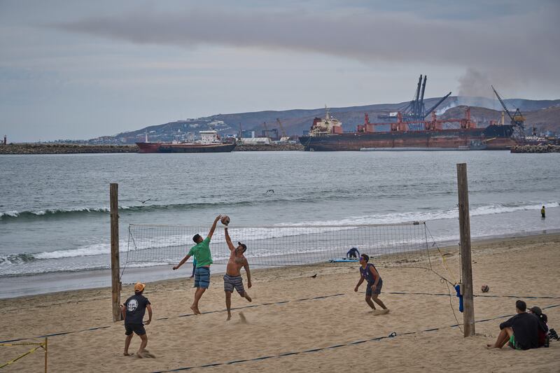 People play volleyball on a beach before the arrival of Hurricane Hilary. Photograph: Alex Cossio/AP