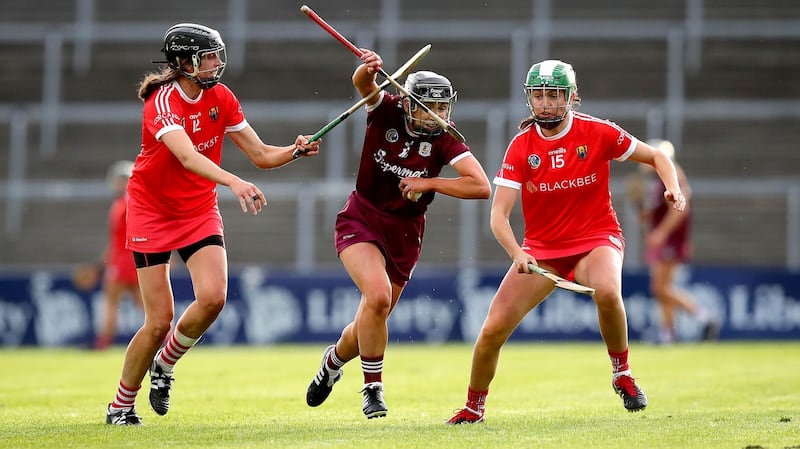 Cork’s Orla Cotter and Hannah Looney in action against  Niamh Kilkenny of Galway during the Liberty Insurance All-Ireland Senior Camogie Championship semi-final  at the LIT Gaelic Grounds in Limerick. Photograph: Ryan Byrne/Inpho