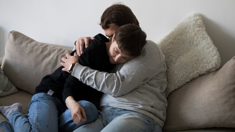 Russian immigrants Polina Loseva (29) and Roman Zhigalov (31) in their temporary apartment in Tbilisi, Georgia. Photograph: Daro Sulakauri/The New York Times