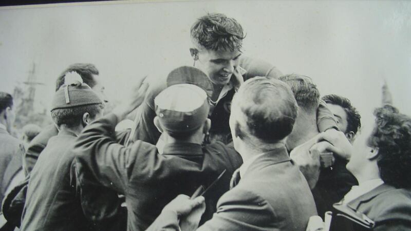 Dan O’Neill is carried from the field following Louth’s 1957 All-Ireland final victory over Cork. success. Photograph: from ‘The Road to 51: The Making of Mayo Football’