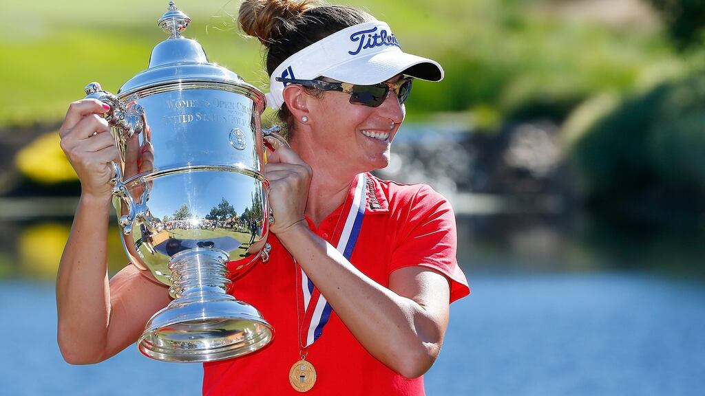 Brittany Lang poses with the trophy on the 18th green after defeating Anna Nordqvist of Sweden in a three hole playoff to win the US Women’s Open at CordeValle Golf Club. Photograph: Jonathan Ferrey/Getty Images