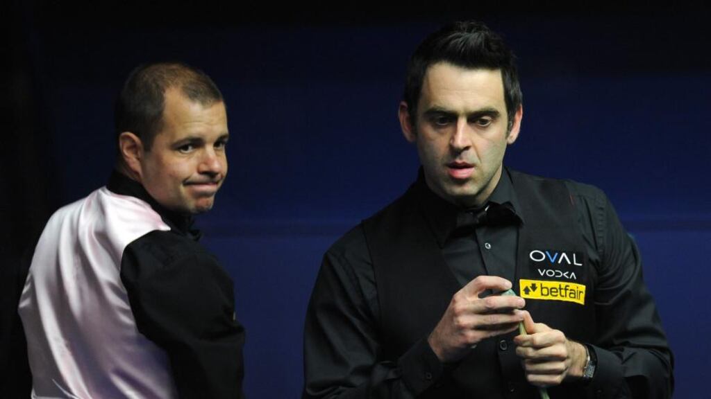 Ronnie O’Sullivan and Barry Hawkins in their final match during the Betfair World Championships at the Crucible, Sheffield.