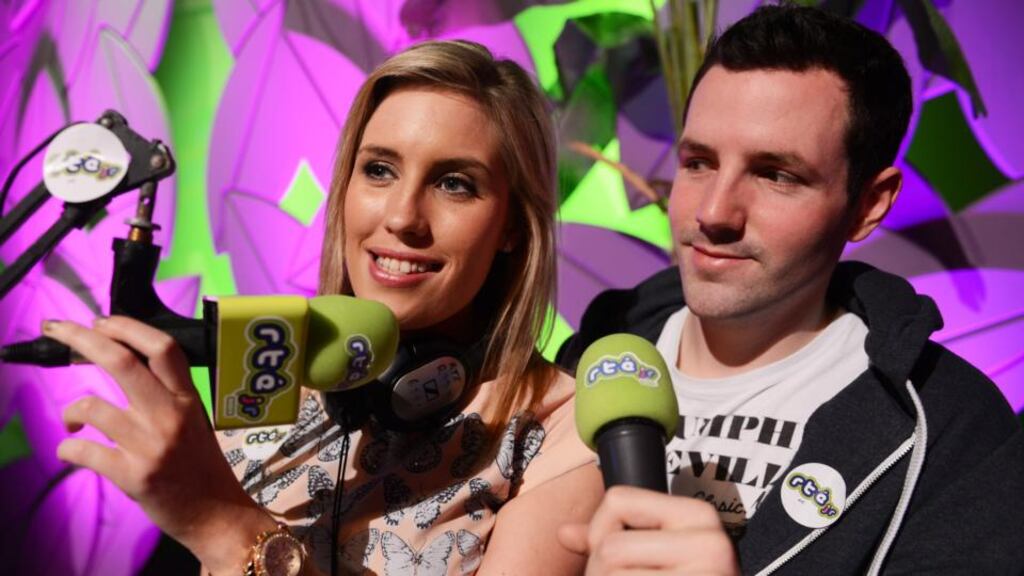RTÉjr Radio
Happy Days
presenter Emma Power and the host of TRTÉ Radio’s
Radioactive
, Colm Flynn, at the launch of the new television, radio and online service RTÉ studios on Monday. Photograph: Cyril Byrne / THE IRISH TIMES