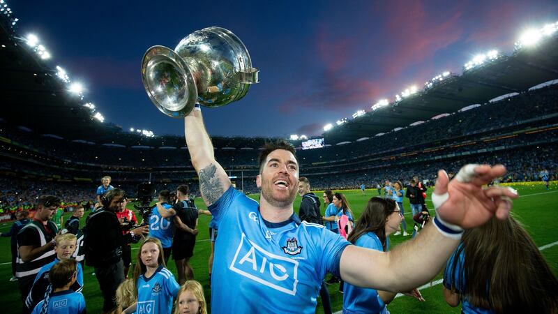 Dublin’s Michael Darragh Macauley with the Sam Maguire after the game. Photograph: Tom Honan