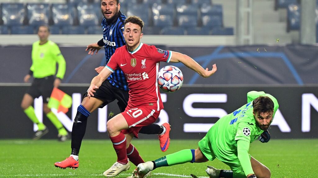 Liverpool striker Diogo Jota scores the first of his goals during the Champions League Group D match against Atalanta at Gewiss Stadium in Bergamo. Photograph: Miguel Medina/AFP via Getty Images