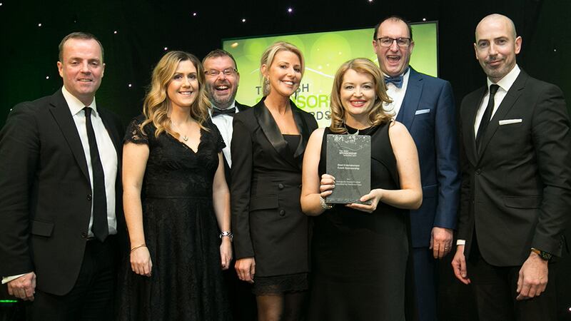 Sean McAuliffe, Co-Founder & Director, Sport Collective, presents the Best Entertainment Event Sponsorship award Energia and GIY team.