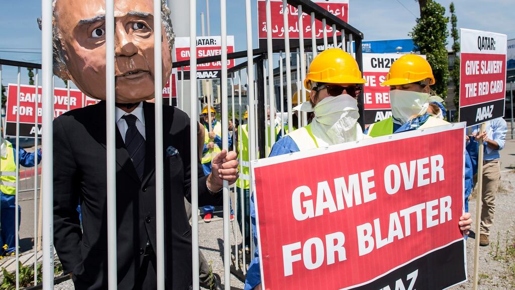 An activist wears a giant mask depicting former Fifa president Joseph Blatter during a protest prior to the Fifa congress in Zurich, Switzerland, in 2015. Photograph: EPA/Ennio Leanza