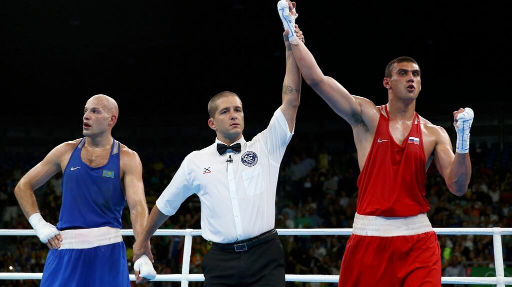 Russia’s Evgeny Tishchenko won gold in the heavyweight competition after receiving a highly favourable judging decision against Vassiliy Levit of Kazakhstan. Photograph: Reuters/Peter Cziborra