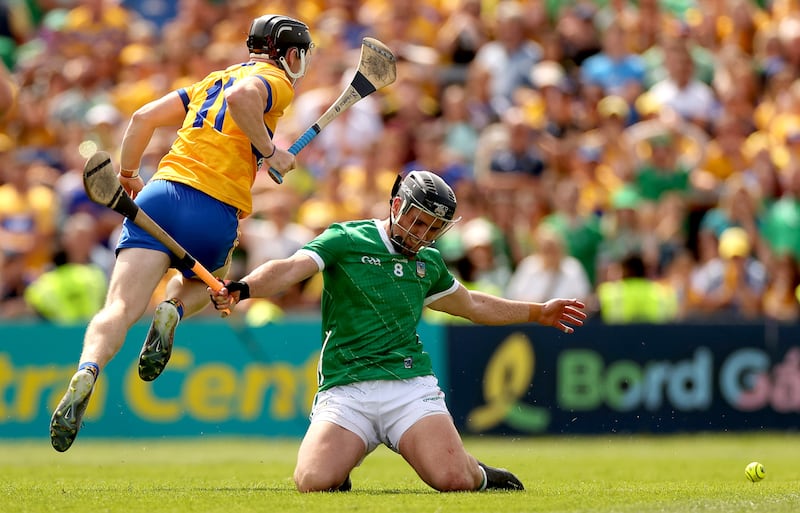 Darragh O'Donovan of Limerick fails to stop Tony Kelly in June. Photograph: James Crombie/Inpho